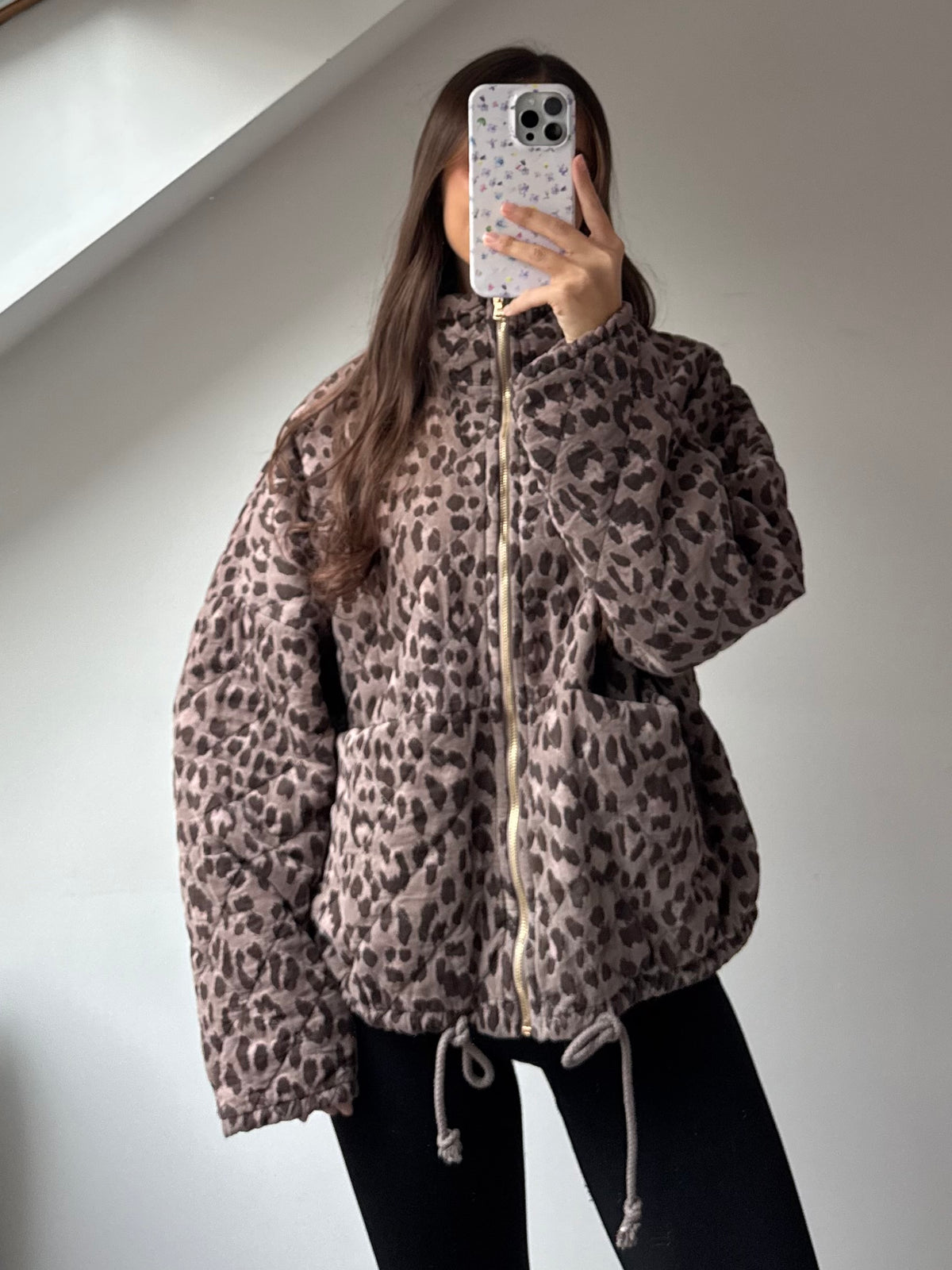 Gesteppte Jacke im Leo Print