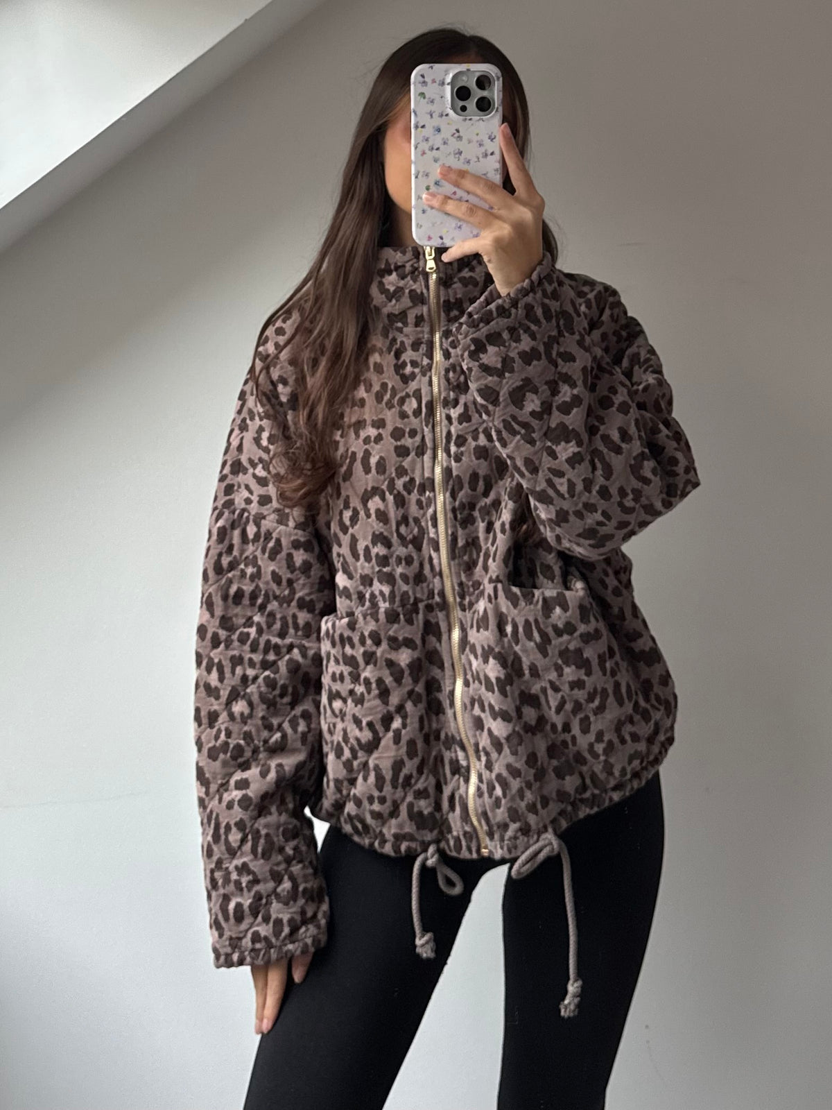 Gesteppte Jacke im Leo Print